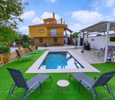 Cogollos de Guadix House | El Coberteras: Oceanfront Bliss with Pool Access