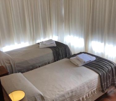 Comuna Estancia Vieja Apartment | Discover El Faro de Carpier: Poolside Comfort Awaits