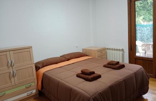 Guarnizo Apartment | Inviting Family Retreat at El Jardín de Nora with Kitchen