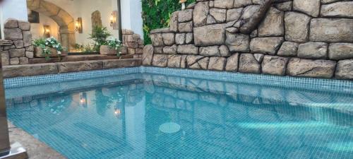 Zahara de la Sierra Hotel | Discover El MANANTIAL: Family-Friendly Haven with Pool