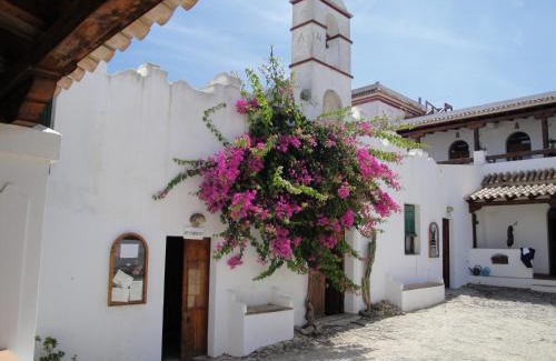 Brena y Marismas de Barbate Natural Park Hotel | Relax at El Palomar de la Breña: Poolside Pet-Friendly Escape
