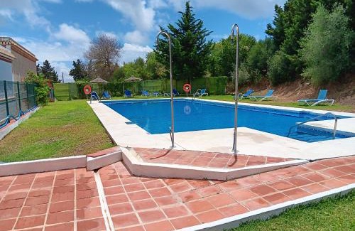 Brena y Marismas de Barbate Natural Park Hotel | Relax at El Palomar de la Breña: Poolside Pet-Friendly Escape
