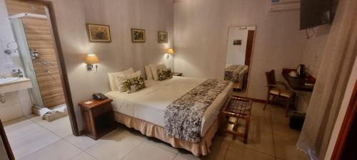 Zona Granja Hotel | Relax at El Pueblito Iguazú - 4-Star Oasis with Pool