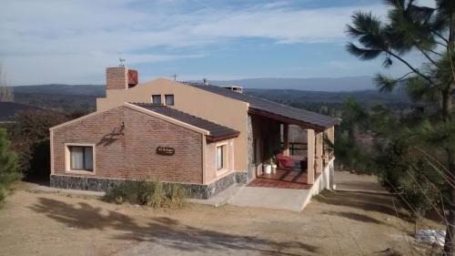 Santa Rosa de Calamuchita Ski Chalet | Discover El Refugio De Posta: Beachfront Bliss Awaits