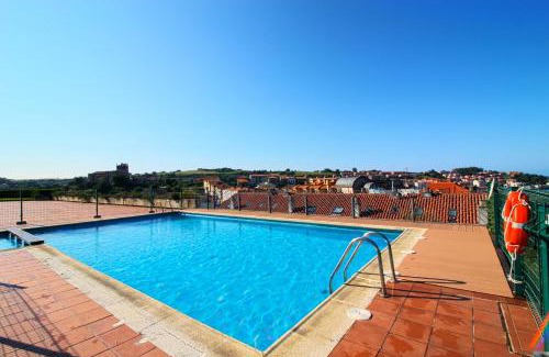 San Vicente de la Barquera Apartment | Relax at El Rincón del Mar: Family-Friendly with Pool