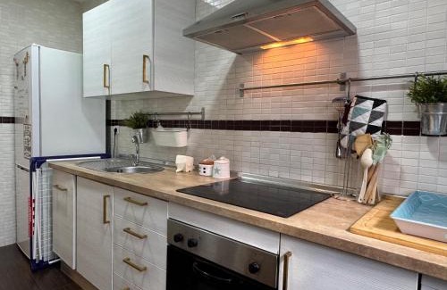 San Lorenzo Apartment | Charming El Rincón del Azahar: Family-Friendly Duplex Escape