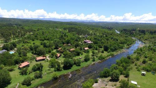 Santa Rosa de Calamuchita Cabin | El Rodeo Apart Cabañas: Oceanfront Retreat with Pool & Hot Tub