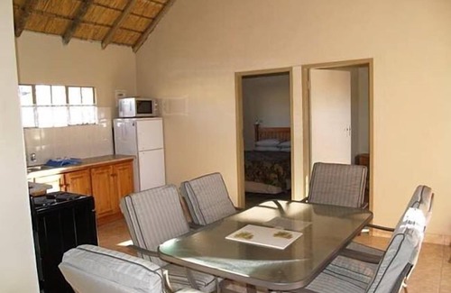 Dullstroom Cabin | Tranquil Elandskloof Trout Farm with Spa & Hot Tub Amenities