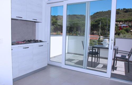 Lido di Capoliveri Apartment | Pet-Friendly Elbaloves Apartments with Pool & Ocean View