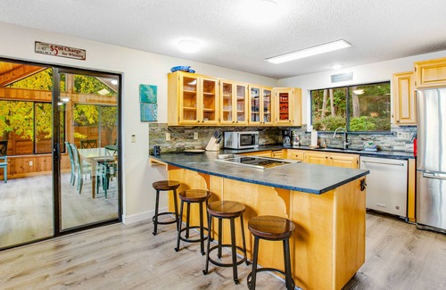 Eldon House | Eldon House waterfront home with firepit, full kitchen, hot tub, & washer/dryer