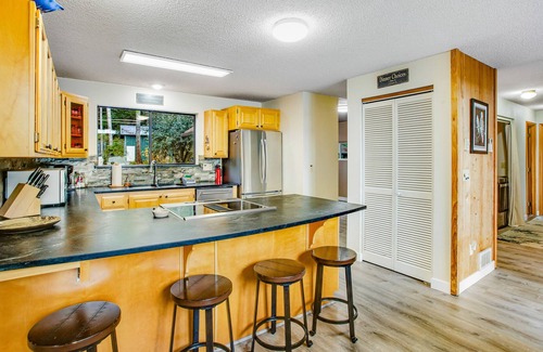 Eldon House | Eldon House waterfront home with firepit, full kitchen, hot tub, & washer/dryer