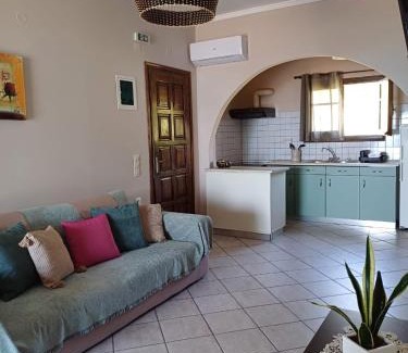 Agios Georgios Pagon Apartment | Experience Eleana Apartments with Oceanfront Views