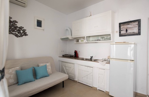 Mykonos Apartment | Discover Eleanna's Deluxe Studio with Cozy Patio Retreat