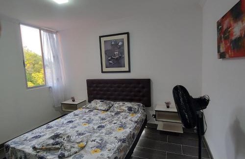 Melgar Apartment | Elegant Comfort and Poolside Relaxation Awaits You