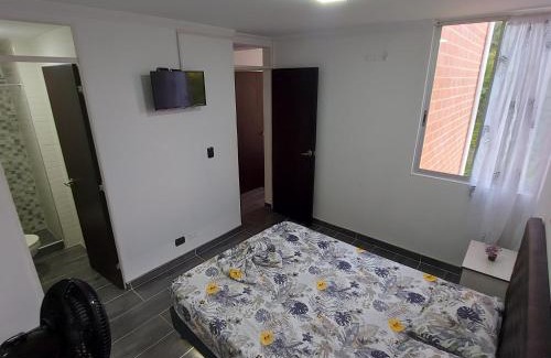 Melgar Apartment | Elegant Comfort and Poolside Relaxation Awaits You