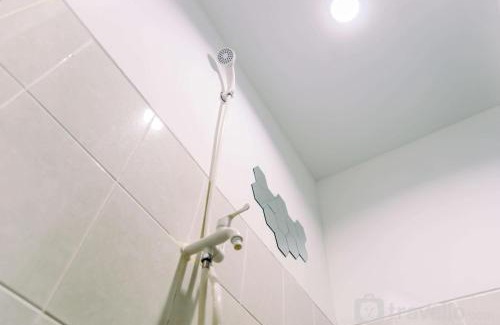South Tangerang Apartment | Cozy Studio at Urbantown Serpong Apartment by Travelio