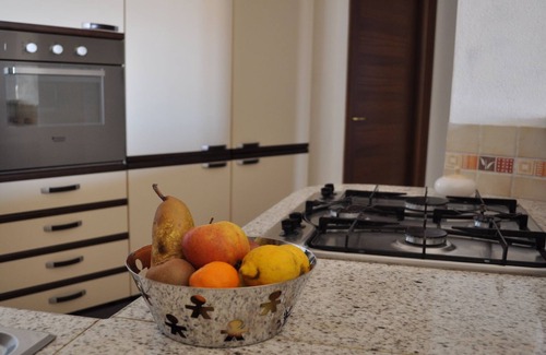 Portoscuso Apartment | Stylish Apartment with Ocean View in the City Center
