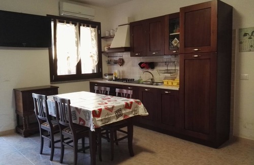 Giba Apartment | Discover a Welcoming Bilo Near Porto Pino and the Sea