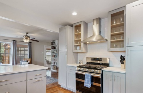 North Loop House | Elegant Escape: Gourmet Kitchen & Inviting Outdoor Living