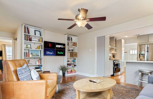 North Loop House | Elegant Escape: Gourmet Kitchen & Inviting Outdoor Living