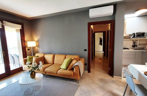 Desenzano del Garda Apartment | Elegant Flat with Large Terrace and Pool Access