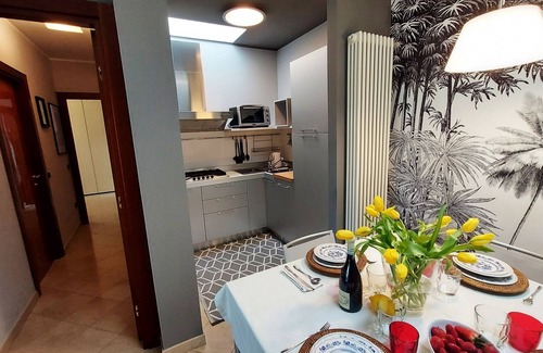 Desenzano del Garda Apartment | Elegant Flat with Large Terrace and Pool Access