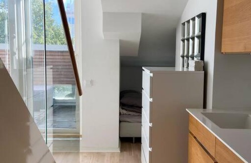 Ullanlinna Apartment | Stylish Penthouse Loft with Family and Pet Amenities