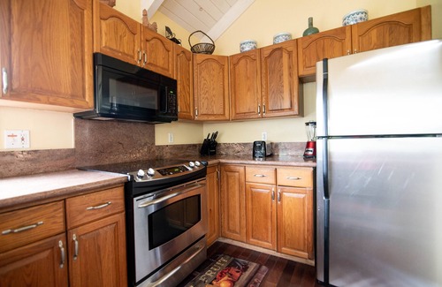 Kilauea House | Secluded Beach Estate with Ocean Views in Moloaa Bay, HI