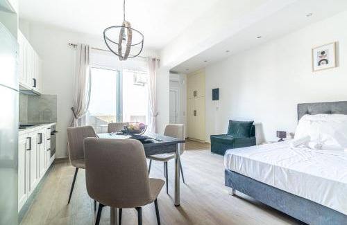 Agios Dimitrios Apartment | Cozy Suite 1 Steps from the Beach - Family Friendly Stay