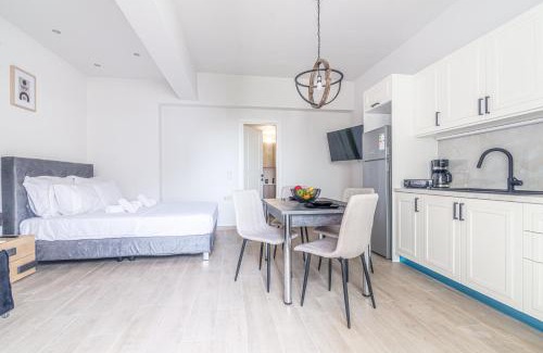 Agios Dimitrios Apartment | Cozy Suite 1 Steps from the Beach - Family Friendly Stay