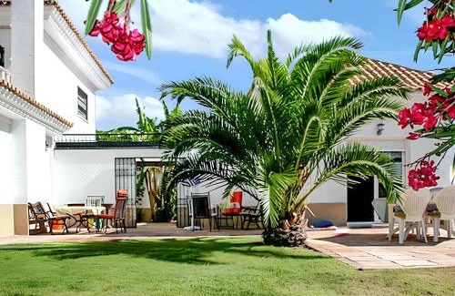 Nuevo Portil Villa | Cozy 3-Bedroom Villa Near Beach with Pool & Garden Access