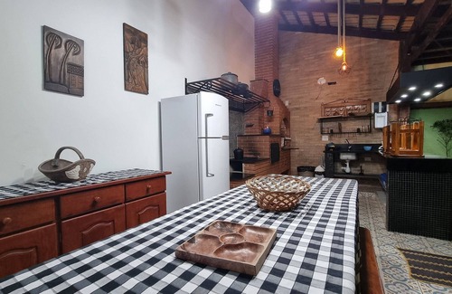 Raul Cury House | Elegant Retreat with Pool, Fireplace & Gourmet Dining