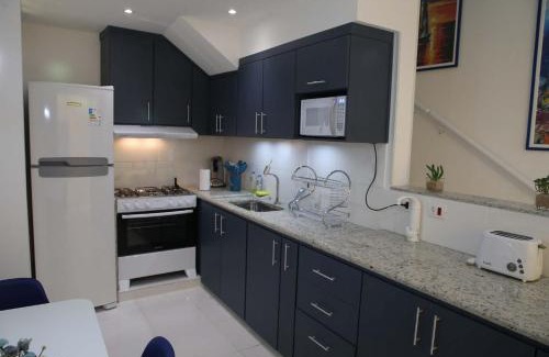 Sao Carlos House | Elegant Duplex Oceanico da Elena with Hot Tub & Breakfast