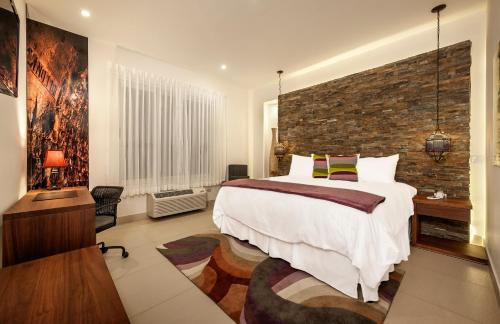 Managua Hotel | Discover Elements Hotel Boutique: Rated 9/10 with Pool Access