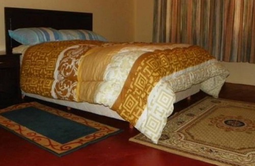 Ngelani House | Elena Lodge: Family-Friendly Retreat with Breakfast Included