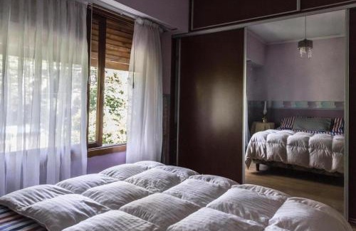 General San Martin House | Pet-Friendly Elena Suites with Hot Tub & Family Comfort