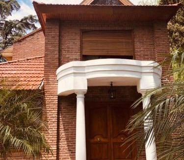 General San Martin House | Pet-Friendly Elena Suites with Hot Tub & Family Comfort
