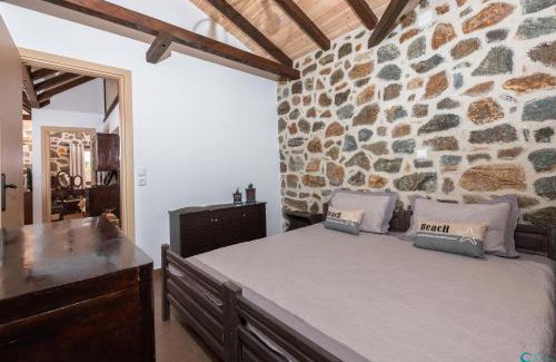 Chrisi Akti House | Discover Eleni's Stone House: Family-Friendly Retreat