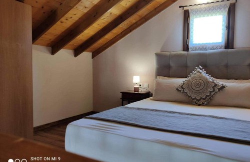 Votsi House | Scenic Elia House with Breathtaking Views Among Olives