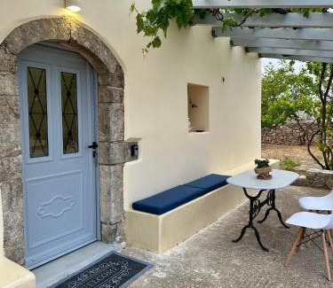 Friligkianika House | Elia Houses - Traditional Retreat with Pet-Friendly Backyard