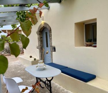 Friligkianika House | Elia Houses - Traditional Retreat with Pet-Friendly Backyard