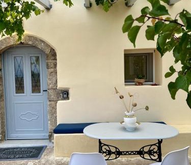 Friligkianika House | Elia Houses - Traditional Retreat with Pet-Friendly Backyard