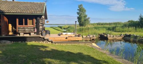 Muriste Ski Chalet | Discover Elimaa-Lepiku: Family-Friendly with Pool & Hot Tub