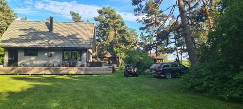 Muriste Ski Chalet | Discover Elimaa-Lepiku: Family-Friendly with Pool & Hot Tub