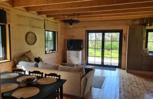 Muriste Ski Chalet | Discover Elimaa-Lepiku: Family-Friendly with Pool & Hot Tub