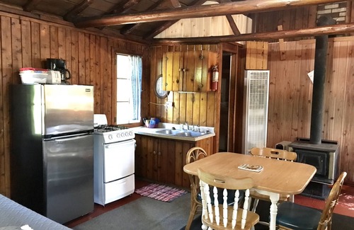 Grawn Cabin | Discover Ellis Lake Resort: Cedar Log Cabin Retreat