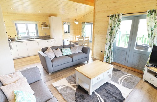 Newland Near Ulverston Cottage | Discover Elm Lodge: Relax with Spa and Hot Tub Amenities
