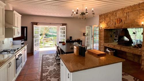 Dullstroom Villa | Elm Tree House - Dullstroom: Cozy Family Retreat Awaits