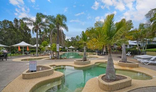 Cams Wharf Villa | Elysian Escape - 4 Pools, Lakeside, Rafferty's Resort