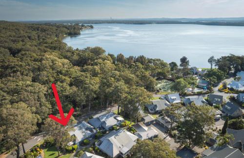 Cams Wharf Villa | Elysian Escape - 4 Pools, Lakeside, Rafferty's Resort